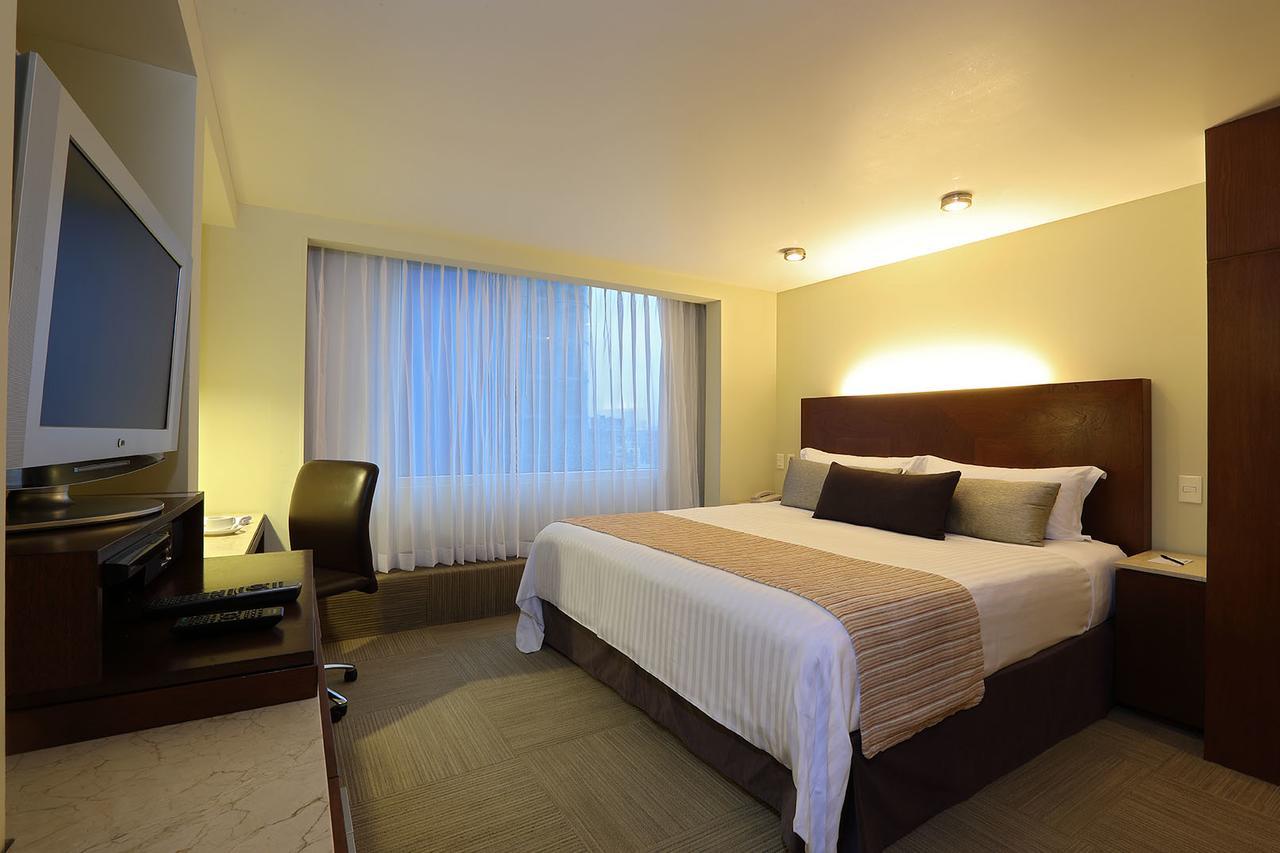 Emporio Reforma Cidade do México Quarto foto A bedroom at the hotel